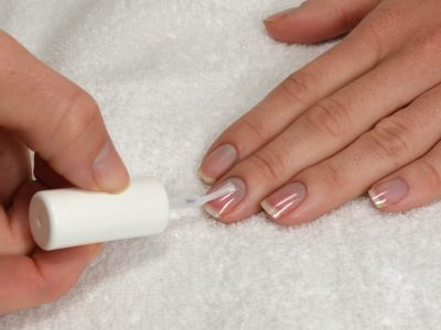 Flaky Bitten And Brittle Nails Without A Manicure. Regrown Nail Cuticle And  Damaged Nail Plate After Gel Polish On Blue Background. Stock Photo,  Picture and Royalty Free Image. Image 204349041.